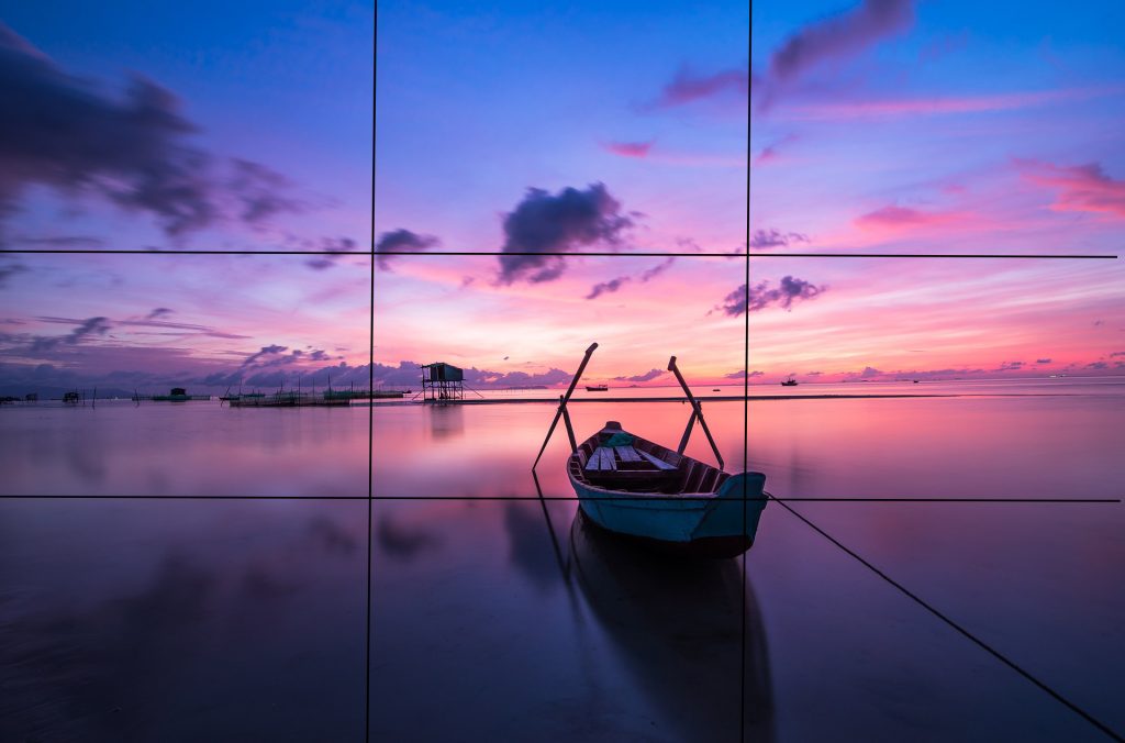 Sunrise boat photo showing rule of thirds grid