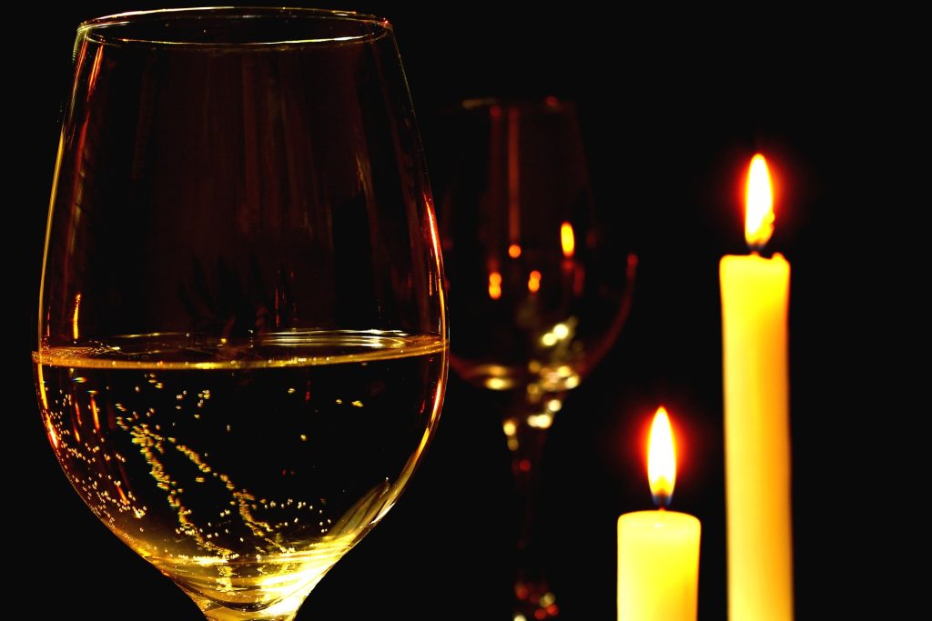 Candles and wine glasses.