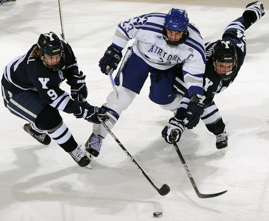 Hockey Photography: Peak action from a hockey game. 