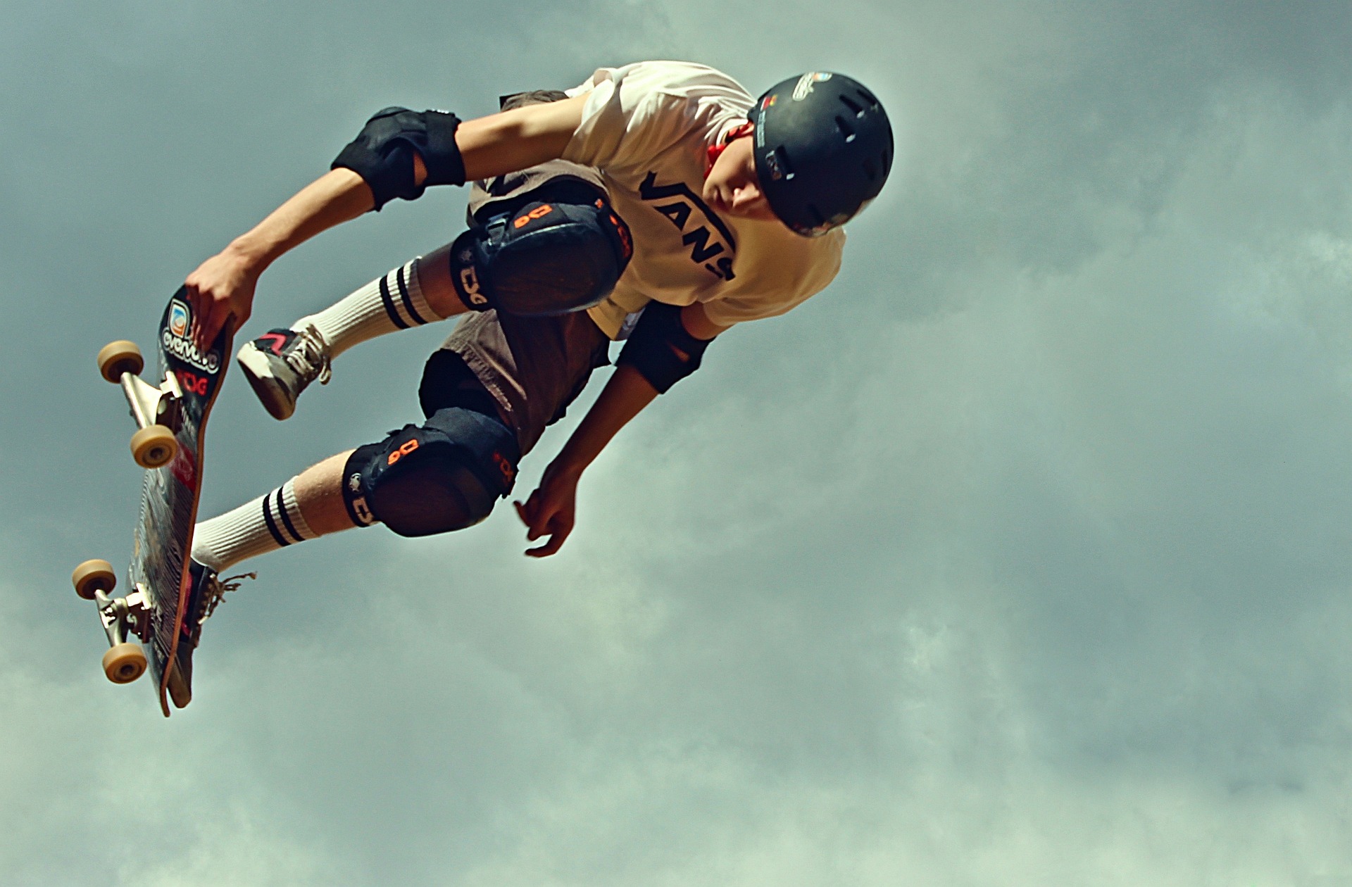 Unlocking the Power of Perspective: How Exploring Different Angles Can Transform Your Photography, skateboard jumping shot from underneath